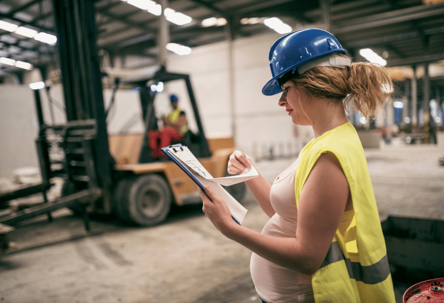 Pregnant-woman-working-in-construction-factory