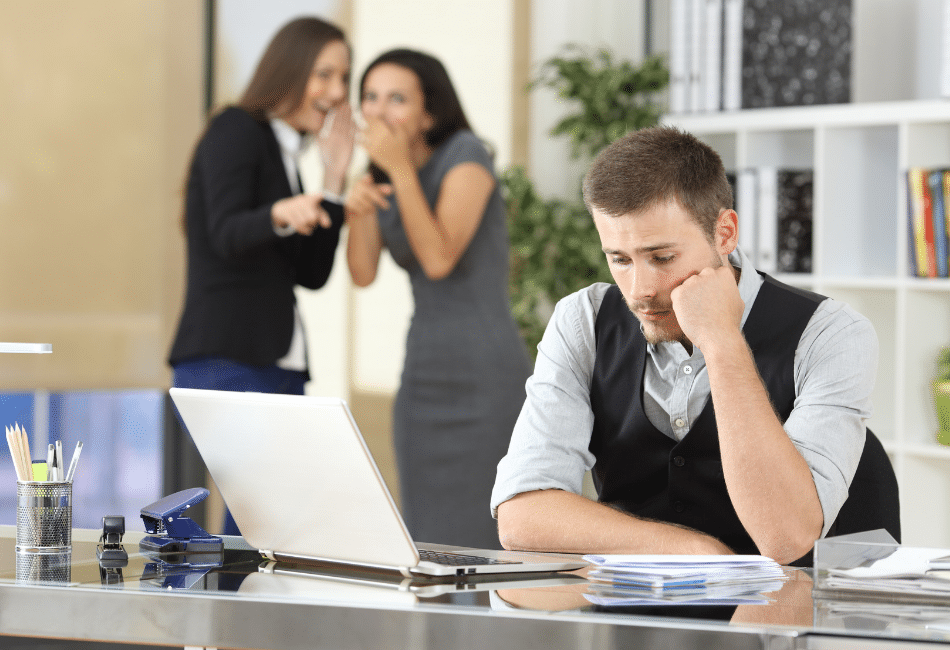 Workers-bullying-a-colleague-at-office